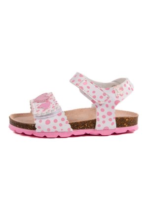 Sandales blanches avec des pois roses, bride réglable, bords festonnés, semelle intérieure rembourrée et semelle en caoutchouc rose.