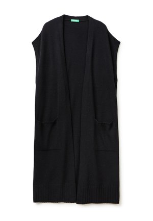 Zwarte mouwloze cardigan van zacht, gebreid materiaal. Voorzien van een open voorkant, twee voorzakken en een geribbelde zoom voor extra textuur.