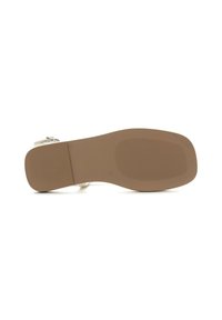Beige sandal sole with a textured rubber surface; features a flat heel and a smooth outline. No embellishments or patterns visible.