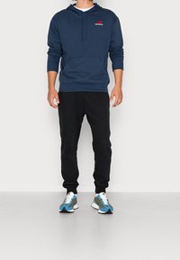 New Balance Jersey con capucha - dark blue