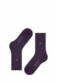 Calzini viola realizzati in un materiale liscio, con polsini a coste e logo sulle suole. Design semplice senza motivi visibili.
