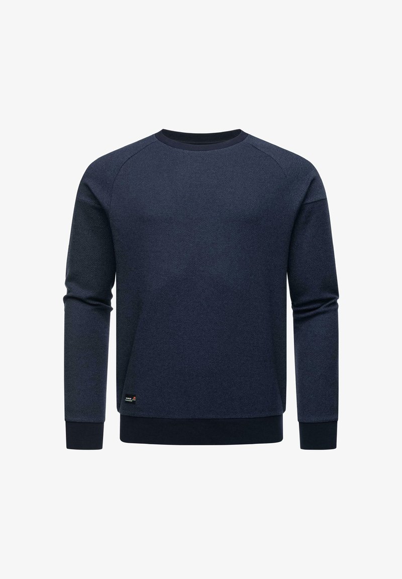 Sudadera azul marino de manga larga, con cuello redondo y una tela texturizada. Presenta un dobladillo y puños acanalados, con una pequeña etiqueta de logo.