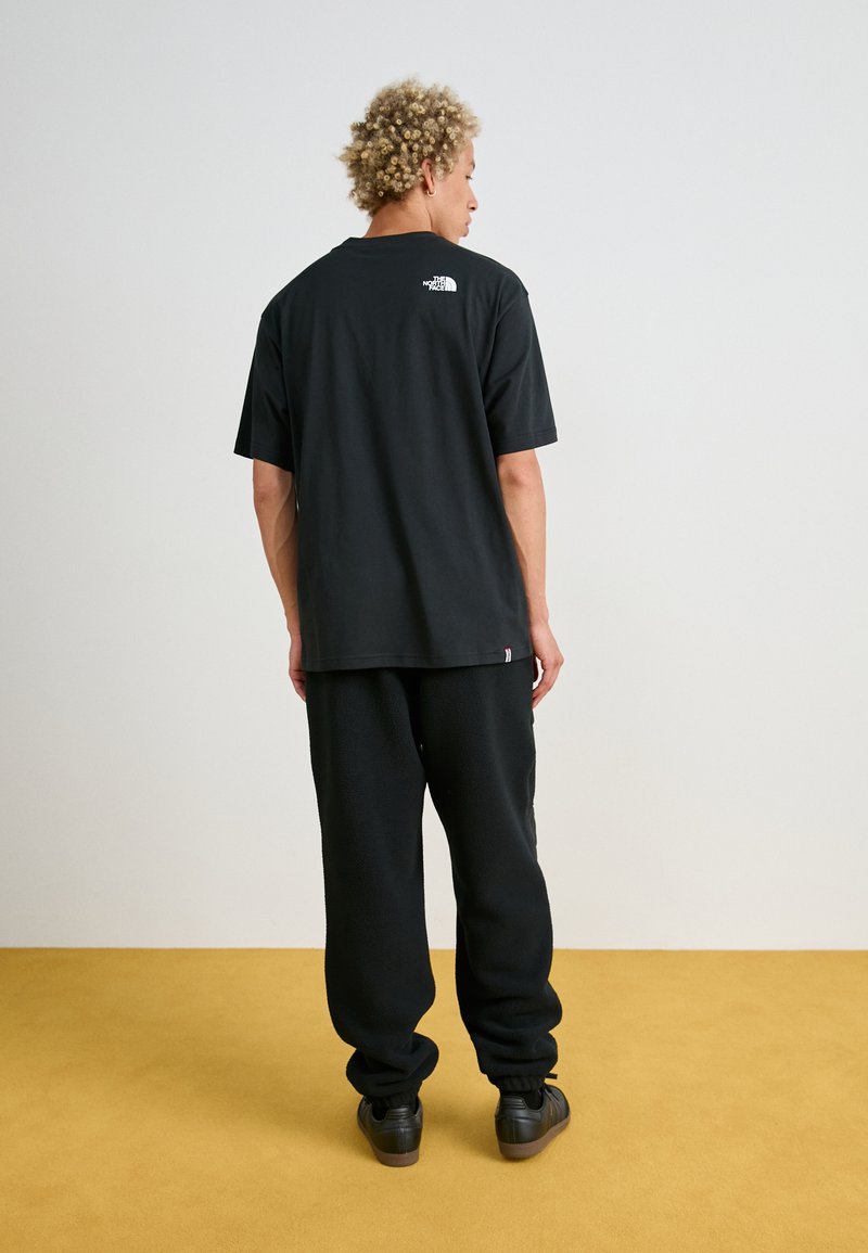 The North Face M RETRO DENALI PANT - Teplákové kalhoty - black