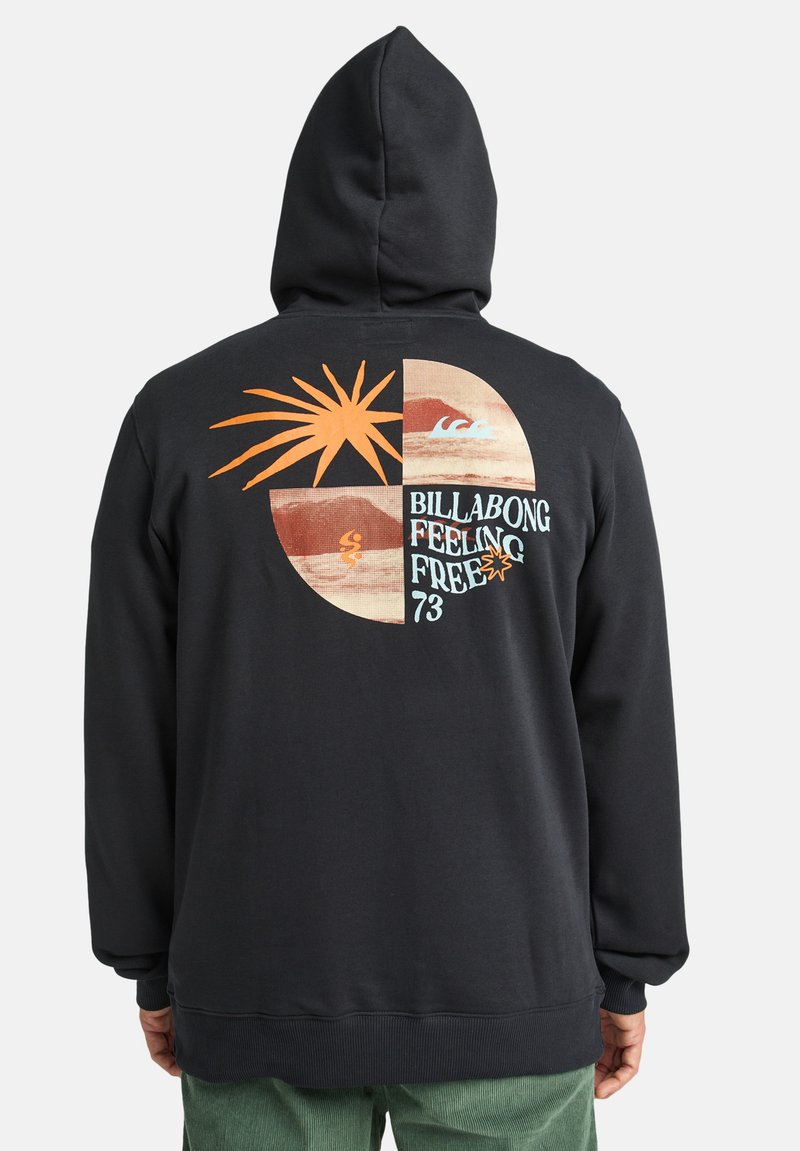 Black hoodie with a colorful graphic on the back featuring a sun, waves, and “Billabong Feeling Free 73” text in a circular design.