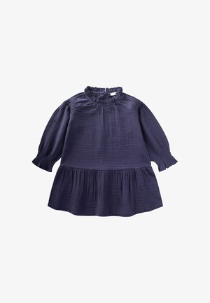 Tmavomodré dlhé tričko pre batoľa s nariaseným volánovým golierom a lemom, s elastickými manžetami na textúrovanom ľahkom materiáli.