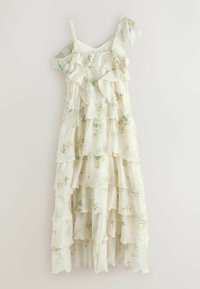 Kremfarvet kjole i lag med blomsterprint, flæsekanter i lag, en skulderrem og en tynd rem, midi-længde, letvægtsstof.