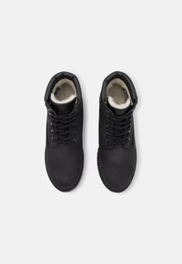 Tamaris Botas para la nieve - black