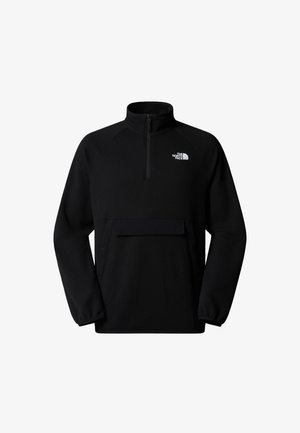 Sweatshirt noir en tissu texturé, avec un col zippé moitié, une poche frontale et le logo "The North Face" sur la poitrine.