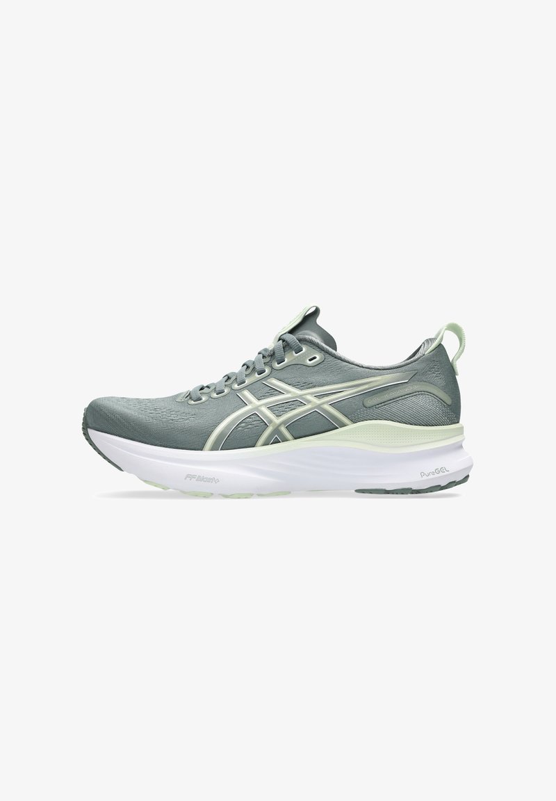 Laufschuh in Hellgrau und Mintgrün. Obermaterial aus Netzgewebe mit synthetischen Akzenten, gepolsterter Schaft und gepolstertem weißen Zwischensohle.