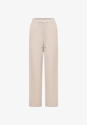 Pantalon beige à jambes larges avec taille élastique et cordon de serrage ajustable, conçu pour un usage décontracté.