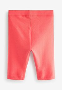 Koraalkleurige katoenen leggings met een gladde textuur, voorzien van een aangesloten ontwerp en omzoomde boorden. Geen zichtbare patronen of metalen details.