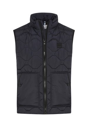 Zwarte gewatteerde vest met een hoge kraag, rits aan de voorkant en twee grote voorzakken. Kenmerkt zich door een gewatteerde textuur en een klein logopatch.