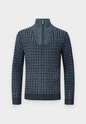 Strikket genser i dunkelblå med et mønstrete tekstur, med høy hals og en halv glidelås foran. Lange ermer og ribbestrikket nederkant.