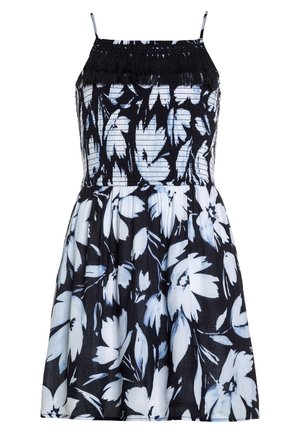 Robe florale en noir et blanc avec des accents bleus, présentant un corsage froncé, des bretelles fines et une jupe évasée jusqu'au genou.