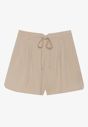 Beige shorts med en myk tekstur, med snøring i midjen, plisserte foran, og en avslappet passform. Runde sømmer og minimalt med tilbehør.