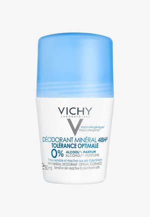 Mineral-Deodorant-Stick in einem weißen Behälter mit einem blauen, runden Deckel. Enthält hypoallergene Kennzeichnung und Indikatoren für 0% Alkohol und Duftstoffe.