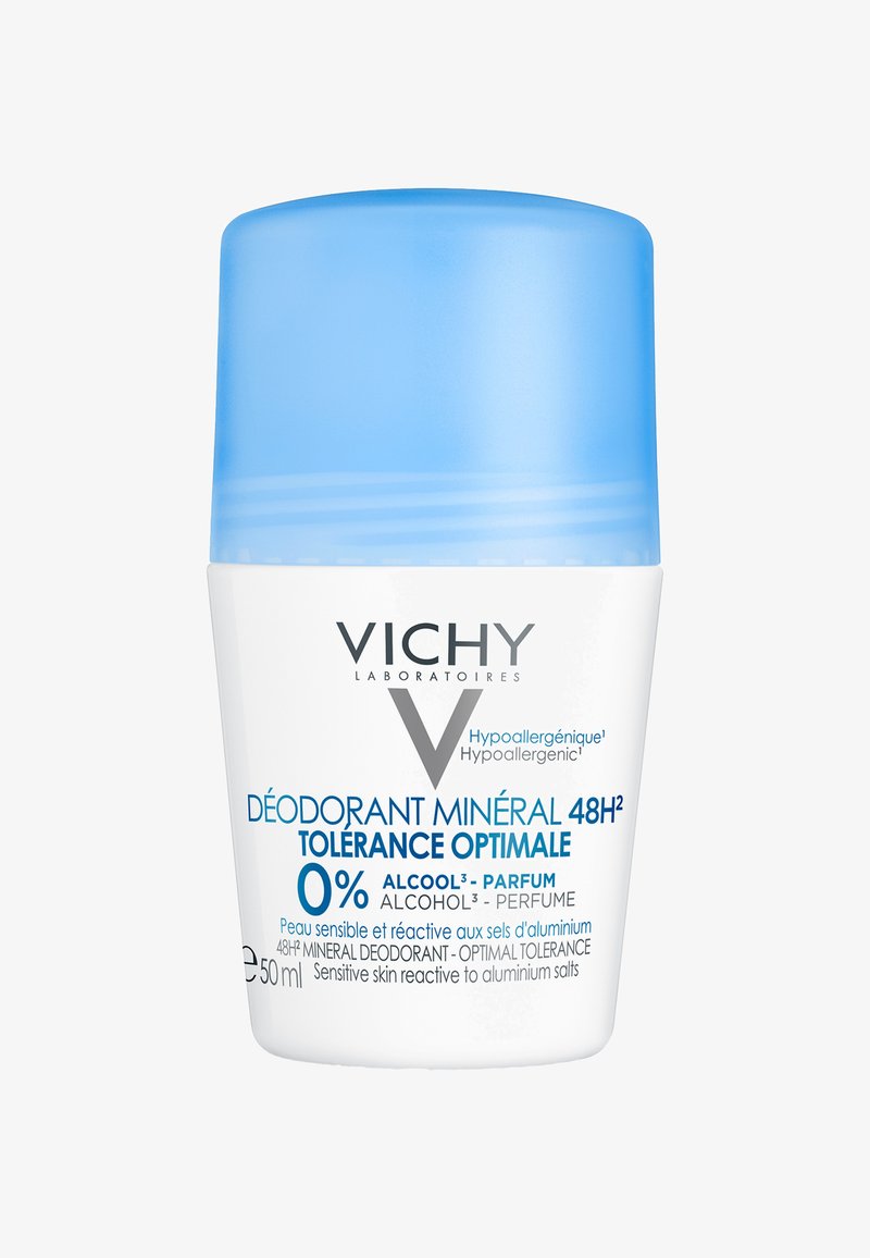 Mineral-Deodorant-Stick in einem weißen Behälter mit einem blauen, runden Deckel. Enthält hypoallergene Kennzeichnung und Indikatoren für 0% Alkohol und Duftstoffe.