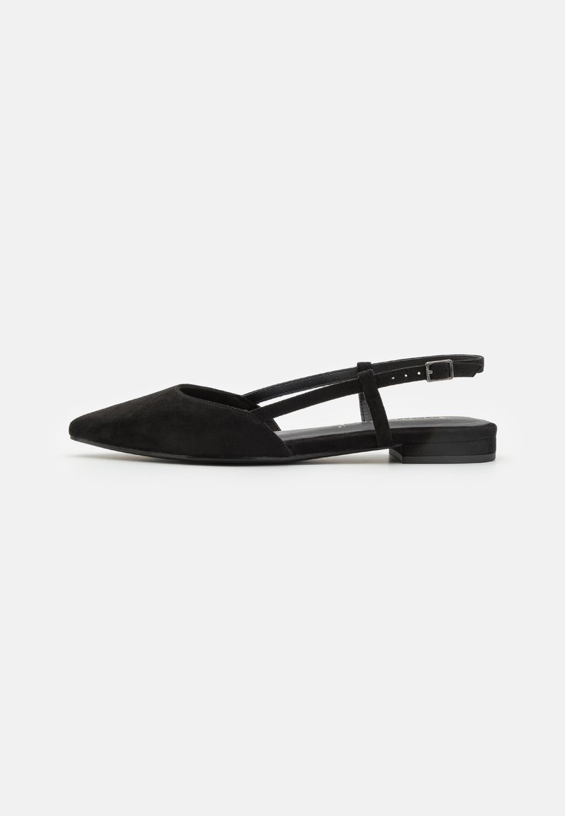 Black suede slingback flats with a pointed toe, open sides, and a flat heel. Adjustable ankle strap features a metal buckle detail.