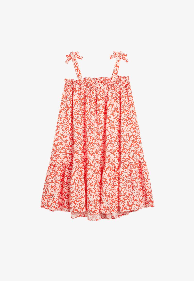 Rotes und weißes, ärmelloses Blumenkleid mit elastischem Oberteil, Rüschenschichten und Schleifen an den Schulterträgern. Aus Baumwollstoff.