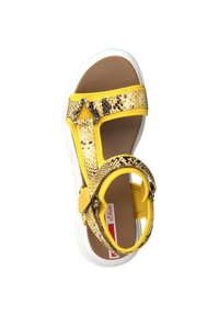 Yellow sandal with a textured, snake-print strap and white sole. Features a single toe post and adjustable ankle strap for fit.