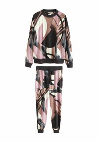Colorful loungewear set featuring a long-sleeve top and jogger pants. Made from smooth fabric with abstract patterns in pink, black, and cream.