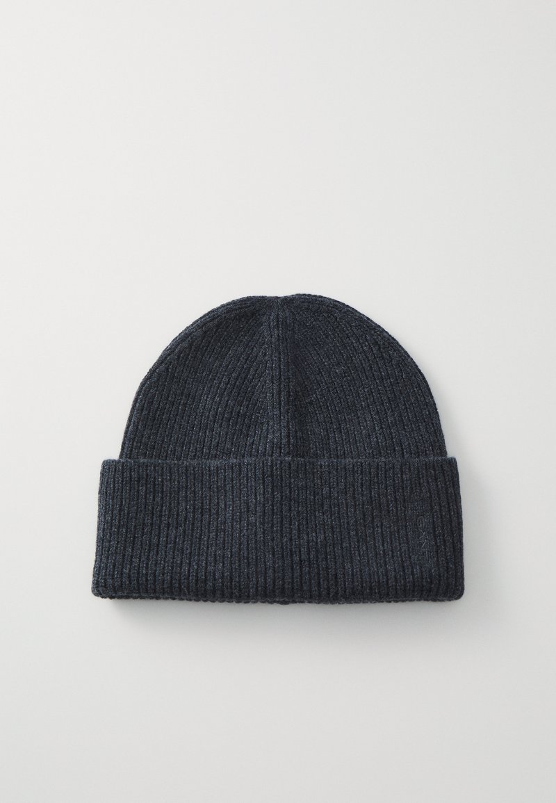 Navy knit beanie, ribbed texture, folded cuff, soft fabric. Displays a small logo on the side. Circular top shape.