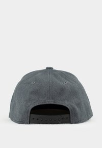 Gray snapback cap made of textured fabric with a flat brim, adjustable strap, and ventilation holes; clean finish at the back.