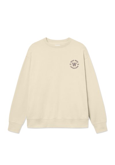 Sweatshirt beige en coton. Présente un col rond, des manches longues et un petit logo graphique sur la poitrine gauche. Texture lisse.