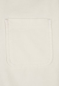 White ribbed fabric featuring a stitched pocket with rounded corners and a clean finish. The texture is soft with a fine pattern.