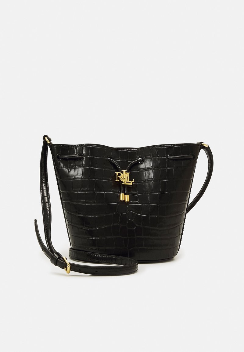 Black crocodile-patterned bucket bag with a textured finish, featuring gold hardware, drawstring closure, and a detachable shoulder strap.