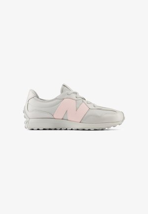 Light grey athletic shoe with a textured leather finish. Features a pink oversized "N" logo on the side and a rubber traction outsole.