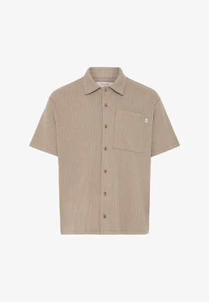 Lühikeste varrukatega beež vahetikandiga nööpidega särk, millel on krae ja rinnatasku, sildiga "ISOLID".