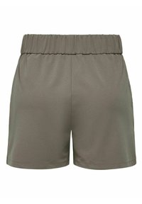 Zelené šortky s elastickým pasem, vyrobené z měkké a hladké tkaniny. Disponují jednoduchým designem bez viditelných kapes nebo vzorů.