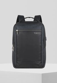 Dark gray backpack with a textured exterior, featuring a large black front zipper pocket and metal accents, designed for practicality and style.