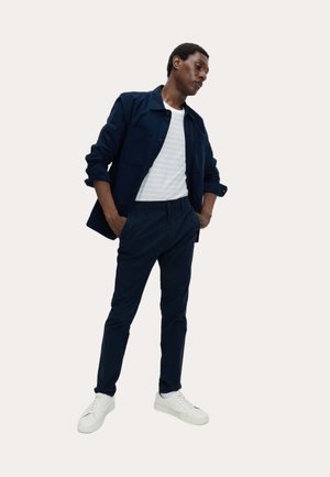Marks & Spencer, - Chinosy