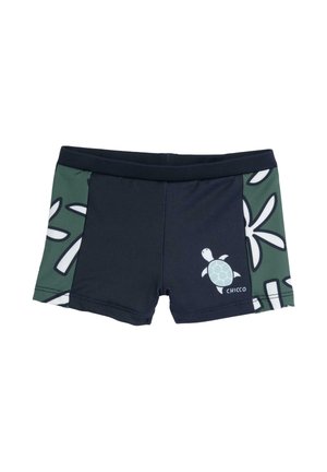 Shorts de bain pour garçons avec un tissu principal bleu marine, un panneau latéral vert orné de motifs de feuilles, et un graphique de tortue sur le devant.