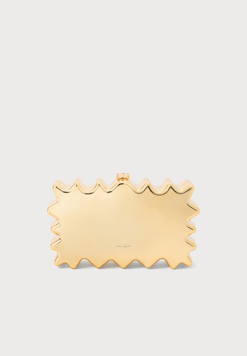 Gold metallic clutch with a wavy, zigzag edge design, featuring a clasp closure and a smooth, reflective surface.