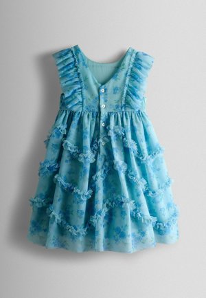 Light blue floral dress made of sheer fabric, featuring ruffled accents, a button-up front, and layered ruffle details along the hem.