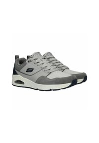Sneaker sportive grigie con un design in mesh e suede, caratterizzate da perforazioni, suola imbottita e chiusura con lacci. Logo sulla linguetta e sul lato.