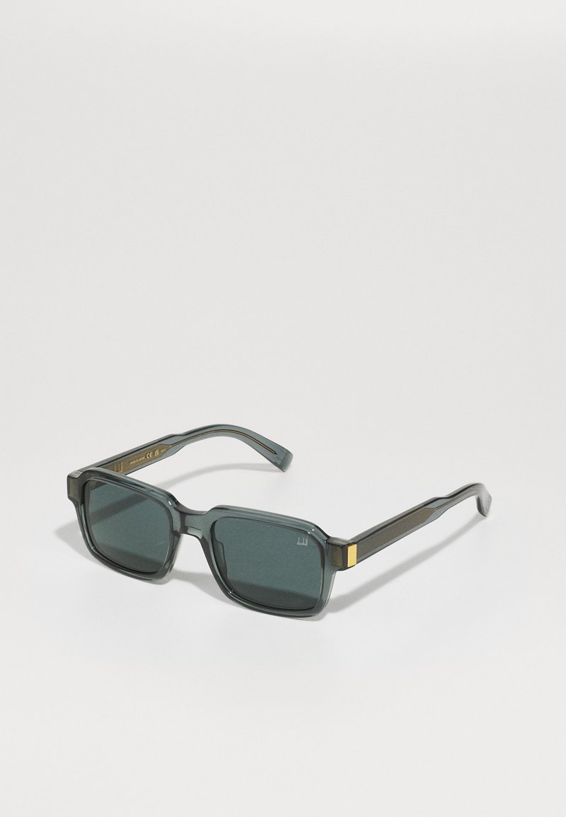 Rectangular sunglasses with dark grey plastic frames, green lenses, and gold accent on the temples. Textured arms provide additional grip.