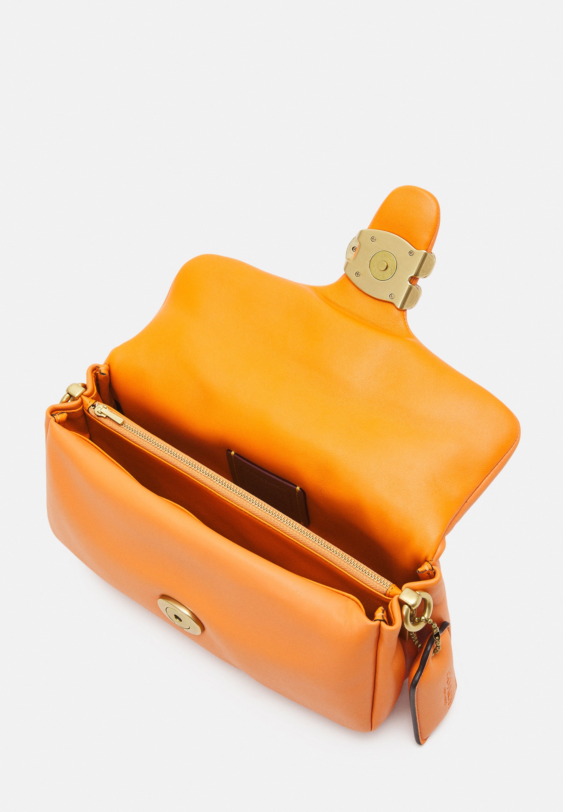 coach pillow tabby candied orange