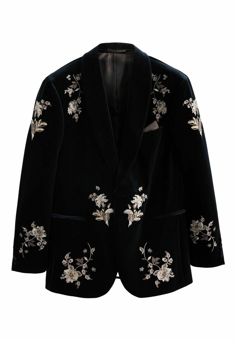 Black velvet blazer with silver floral embroidery, shawl collar, two front pockets, and a single button closure. Inside pocket detail visible.