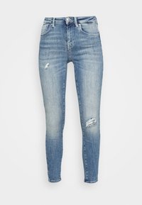 Blå denim skinny jeans med en urtvättad ton, med slitna lappar fram, femfickorsdesign och bälteshällor.