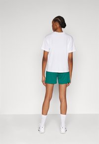 Champion ICONS SHORTS SMALL LOGO - Pantalón corto de deporte - dark green