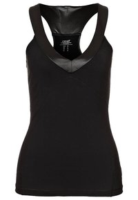 Top deportivo sin mangas para mujer negra, con tirantes anchos y detalle en V brillante, etiqueta de talla visible en el cuello trasero.
