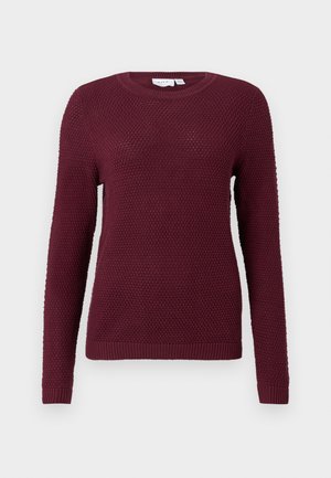 Burgundy neulepusero, jossa on teksturoitu kuvio, pyöreä kaula-aukko ja pitkät hihat. Ribbaatut hihansuut ja helma. Mukava malli viileämpiin sääolosuhteisiin.