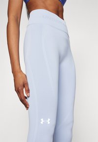 Under Armour TRAIN SEAMLESS - Leggings - celeste/white