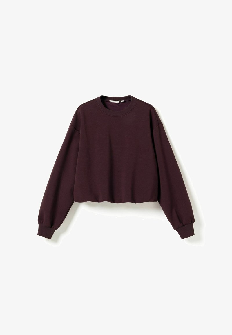 Sweat-shirt court à manches longues de couleur violet foncé avec poignets côtelés et col rond, disposé à plat sur un fond blanc.