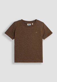 Brun kortærmet t-shirt lavet af blød bomuld. Har en rund halsudskæring og et lille, lysebrunt logo på brystet. Enkel design.
