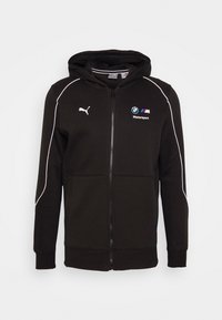 Sudadera con cremallera negra, con un cuerpo texturizado, acentos en blanco y los logotipos de Puma y BMW Motorsport en el pecho. Cuenta con capucha y puños de canalé.